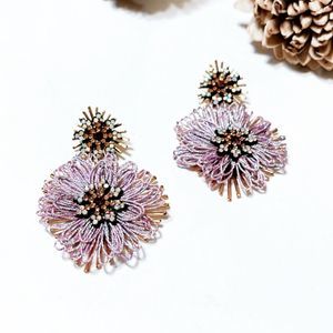 Flower statement earrings in purple